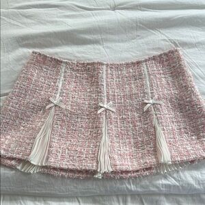 Elegant Pink Tweed Skirt with Tassels